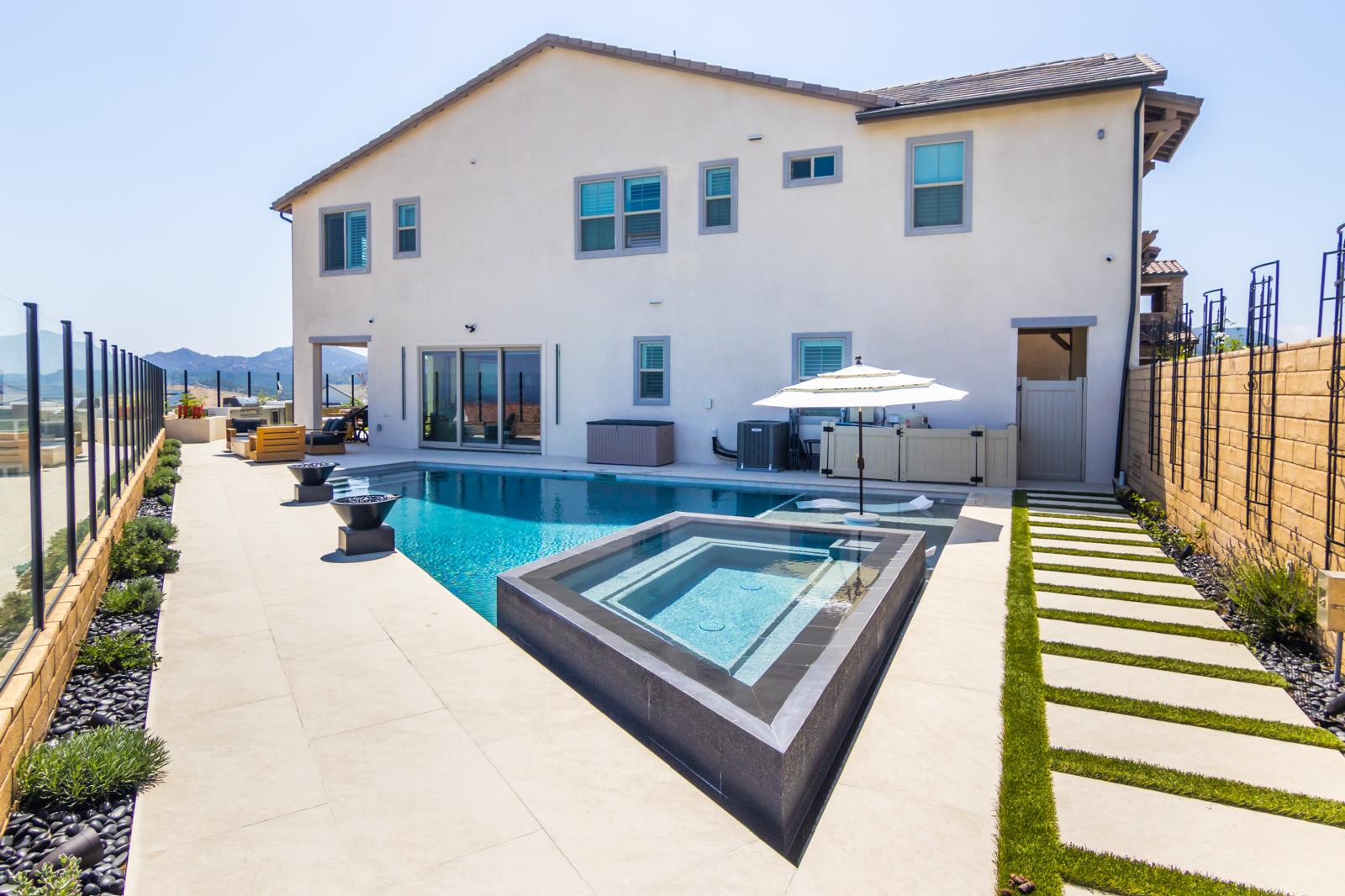 Custom pool and spa project with mountain backdrop in Sterling Ranch by Pool Masters LA — photo 2