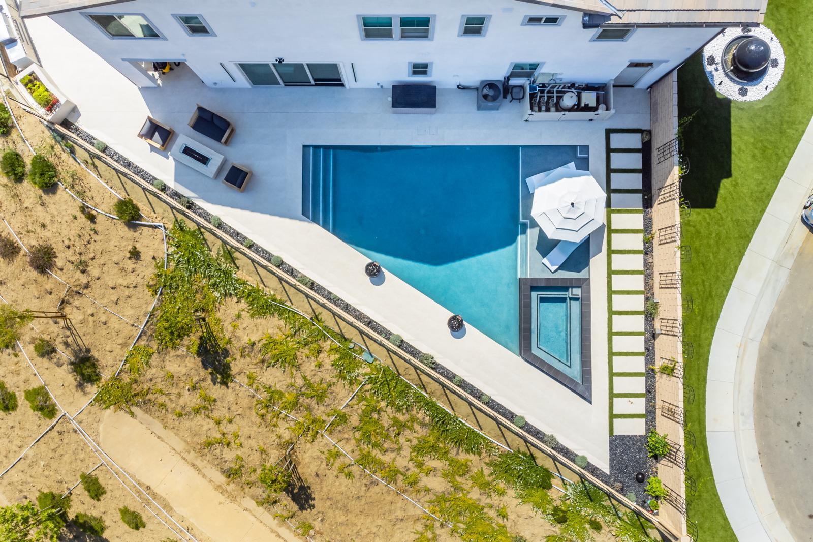 Custom pool and spa project with mountain backdrop in Sterling Ranch by Pool Masters LA — photo 4