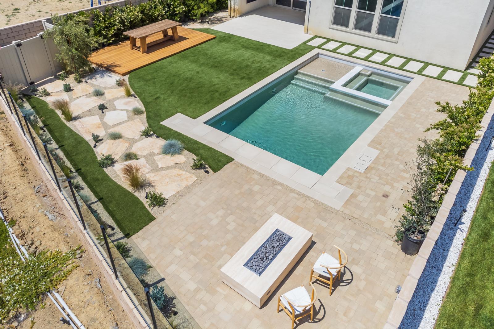 Luxury custom home with blue-lit water feature in Sterling Ranch by Pool Masters LA — photo 2