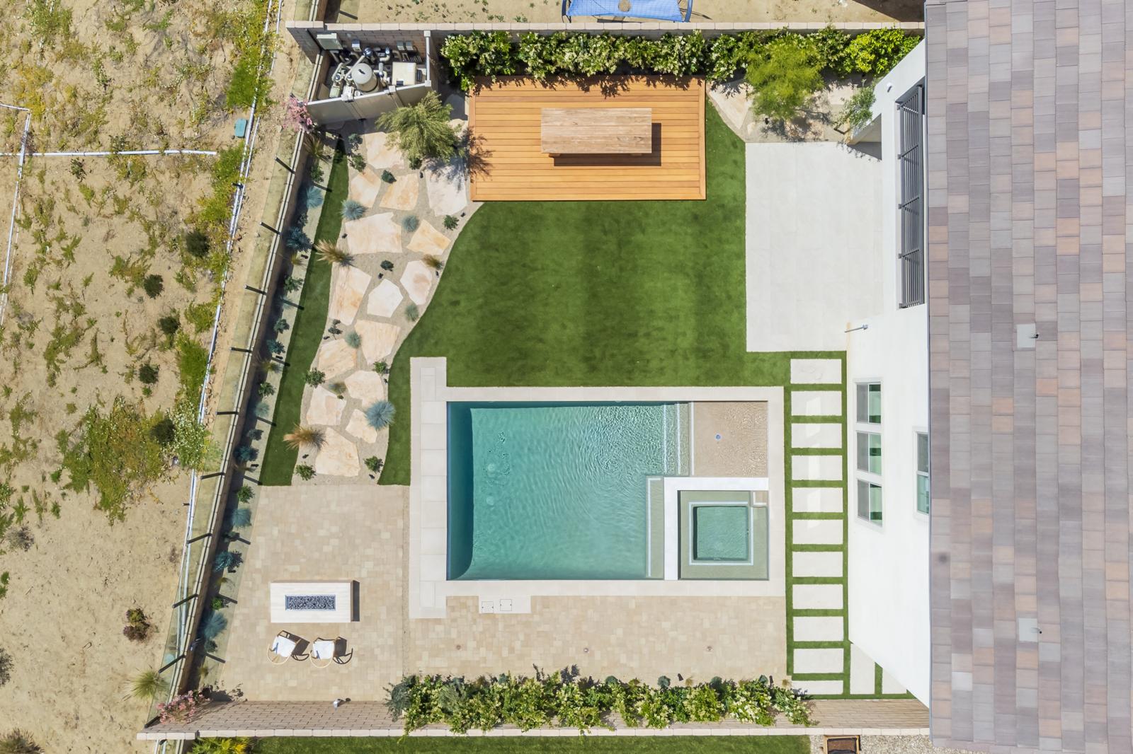 Luxury custom home with blue-lit water feature in Sterling Ranch by Pool Masters LA — photo 3